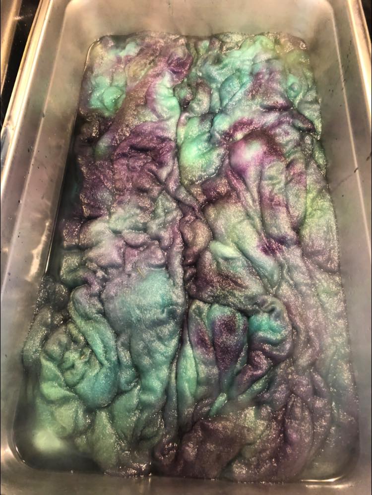 Fibre in a restaurant pan dyed purple and green